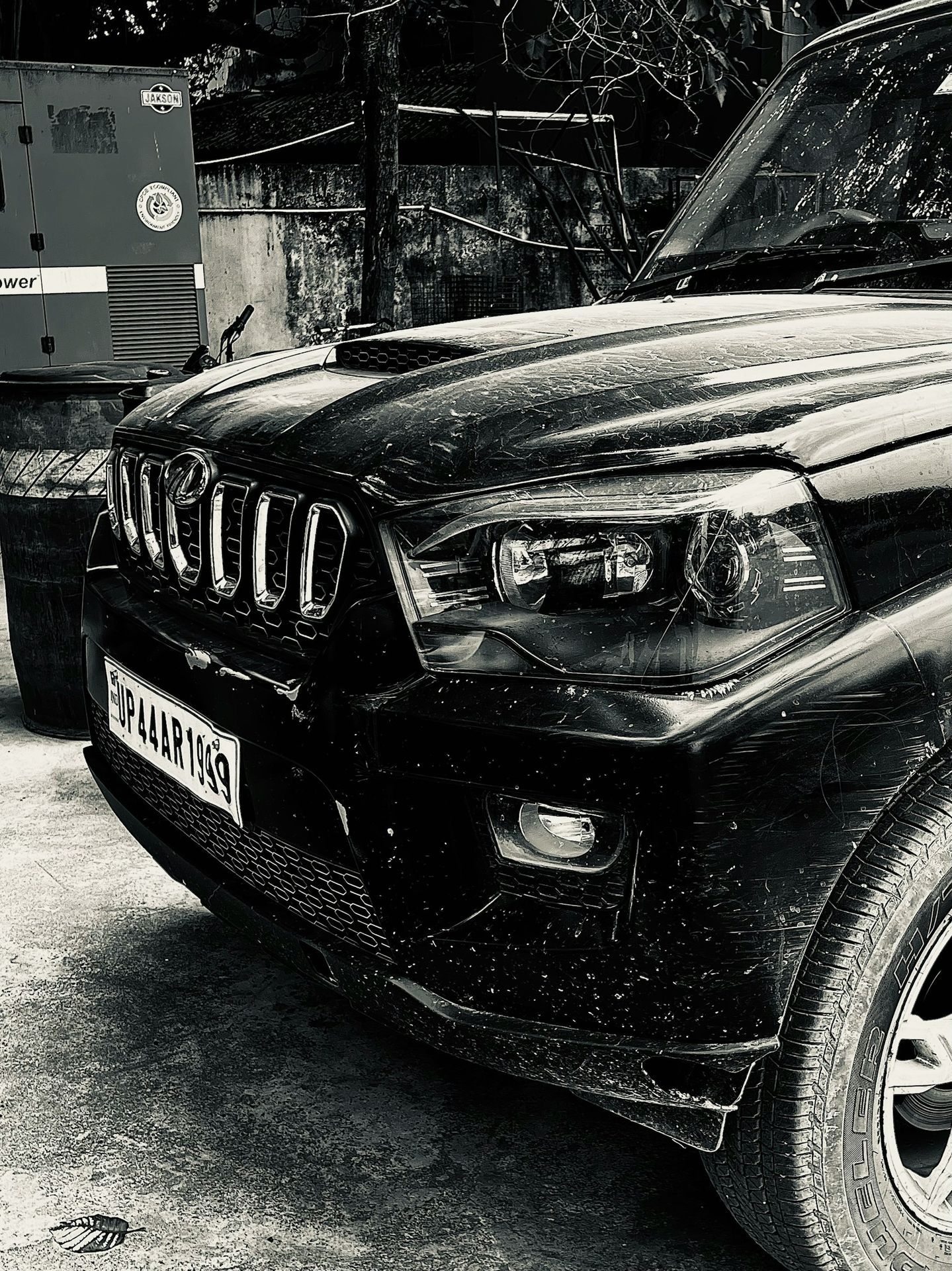 a black and white photo of a jeep
